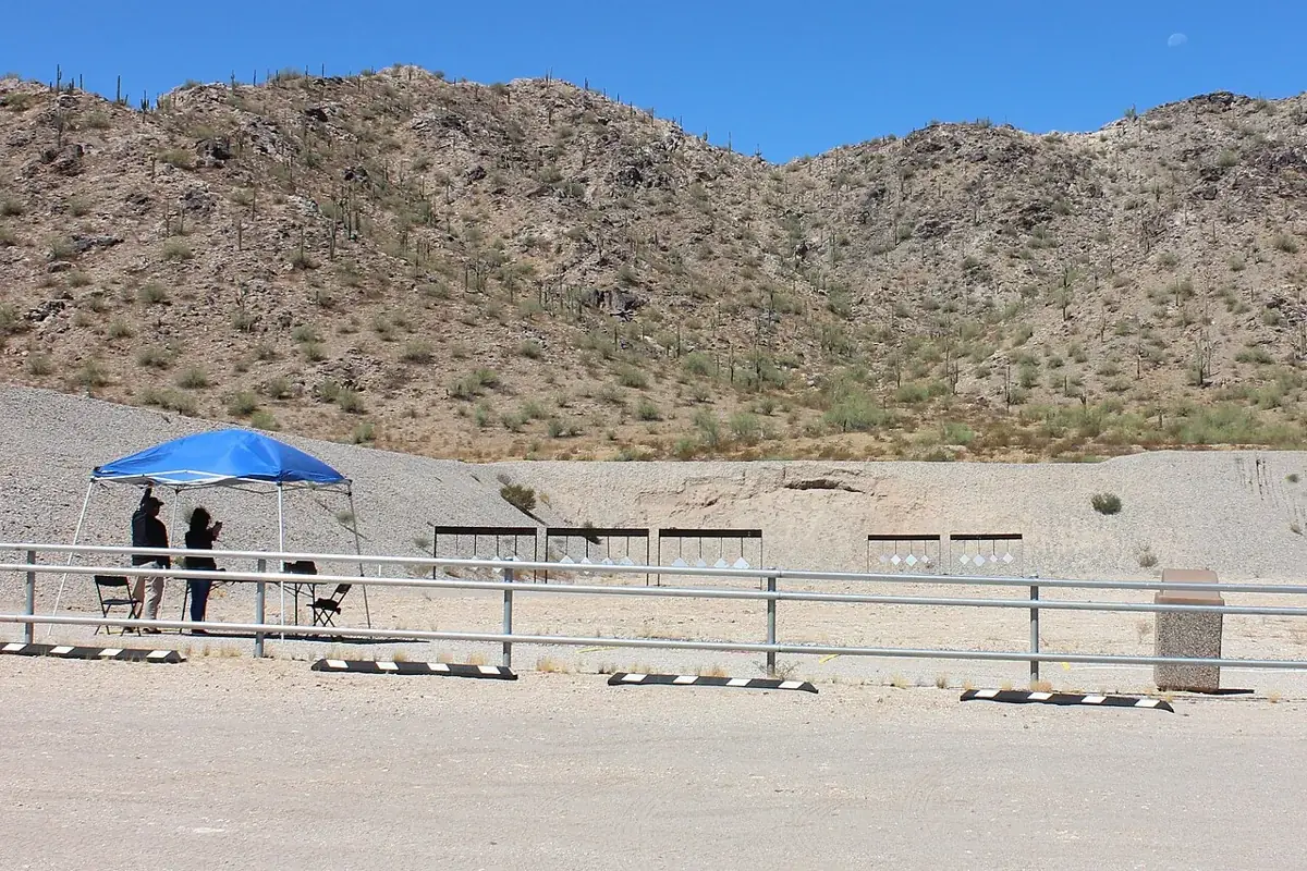 Shooters practicing at a public outdoor pistol range